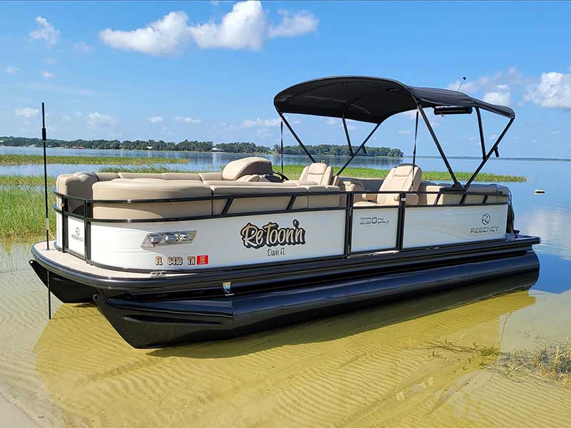 Pontoon boat with boat name